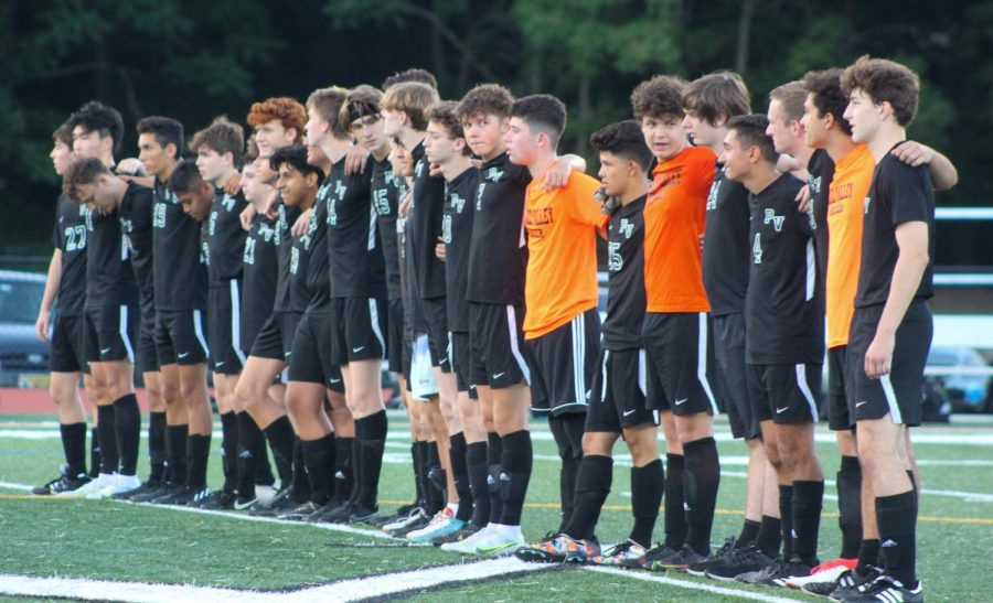 Last seasons PV Boys Soccer Team lines up at midfield before a game. With the teams large graduating class, the boys look to utilize their experienced midfield and young newcomers this season.