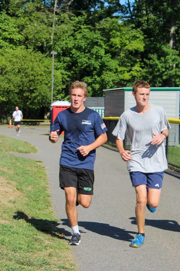 Marc Monti runs with graduated Connor Oates. Returners, like Monti, and newcomers look to lead Valley to success.