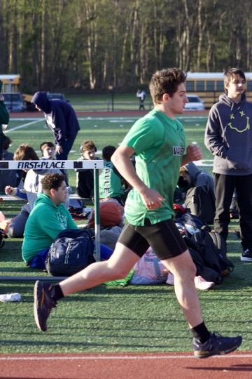 Senior Michael Pizzella runs in a track meet. Check out all spring sports in the Week in Review below.