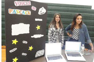 Sophomores Regina Guzzo, left, and Julia Veloso are running a Pascack Period offering called "Writing and Examining Poetry."