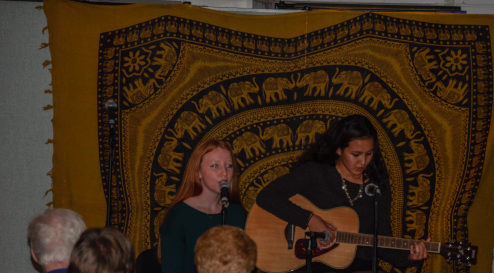 Juniors Megan Doody and Hana Shapiro perform during Fridays Coffeehouse in the PV cafeteria. The event benefited the PV Chamber Choir.