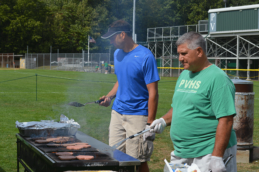 PV+administrators+Mr.+John+Puccio+%28left%29+and+Mr.+Tom+DeMaio+%28right%29+grill+at+last+years+homecoming+barbeque.