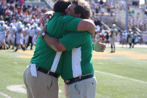 William VanKersen (left) sharing an embrace with longtime head coach Craig Nielsen. Cusumano was named Nielsens successor on Monday. 