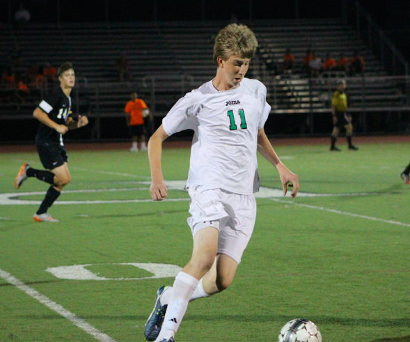 Senior midfielder Mike Lin dribbling the ball. Lin, along with Ryan Miller were integral to PVs success last year, as both combined for 34 goals and both received All-County honors