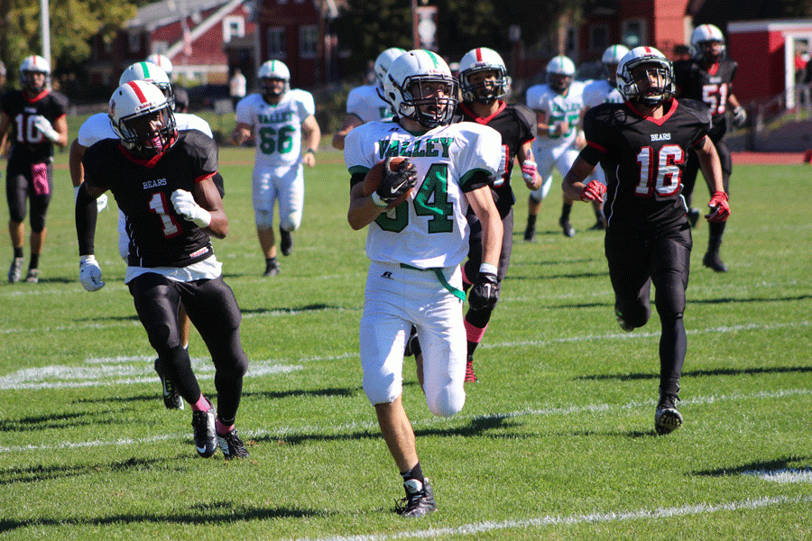 Josh Tillis takes off on a long run during Pascack Valleys 49-13 victory over Bergenfield on Saturday.