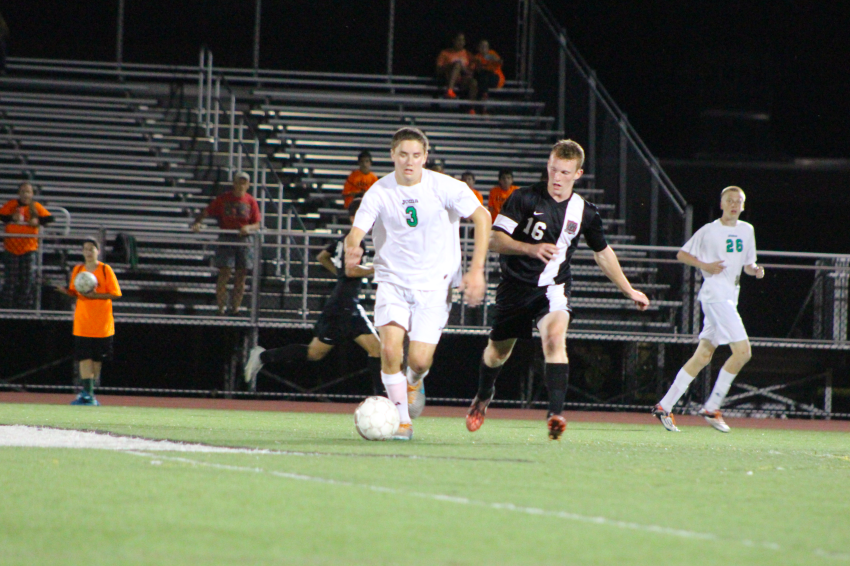 Ryan Miller dribbling the ball towards goal at the Zack Latteri Memorial Game against Northern Highlands