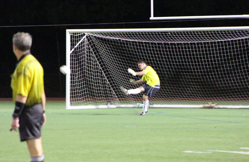 Goalie Josh Ulin punting the ball.