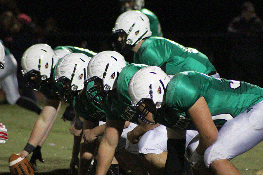 Quarterback Colin Dedrick behind his offensive line before a play in PV's 34-19 first round playoff win over Bergenfield.