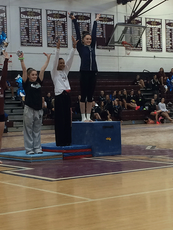 Senior Jillian Dean wins bars at the State Sectional meet. Her and freshman Melissa Ricciardi are moving on to the State Finals.