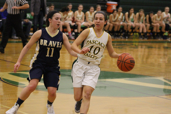 Sophomore Toriana Tabasco with the ball against Indian Hills