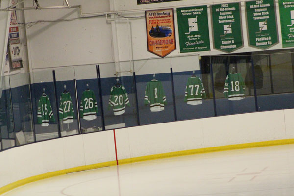 The Pascack Valley ice hockey team honoring its seniors by hanging their jerseys.