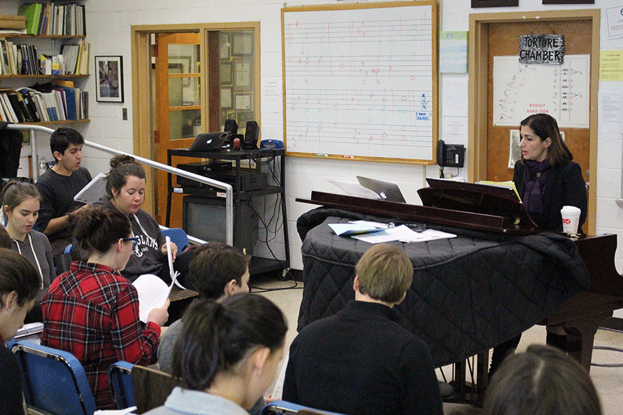 Mrs. Argine Safari rehearses music with her Chamber and Concert Choirs. 