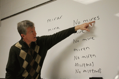 Señor Lewis teaches his Spanish 5 class commands. 