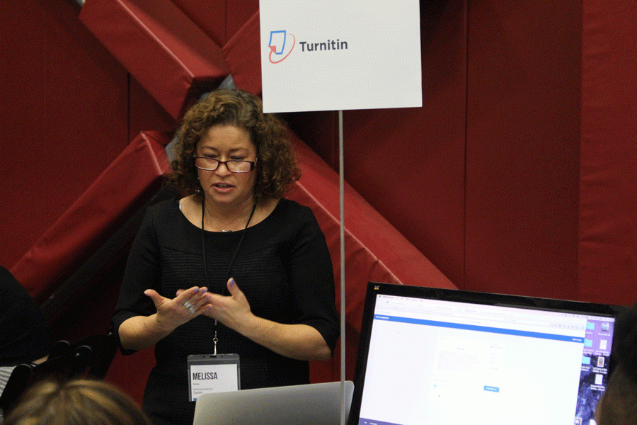 TurnItIn representative Melissa Perlman presenting products to educators.