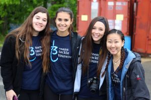 (From left to right): Sophomores Amber Bovenshulte, Chelsea Scoli, Melissa Purcell, and Emily Park pose at the Teen Tackle Tourette's Walk.