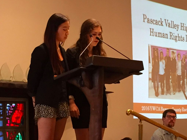 Seniors Zoe Ziegler and Grace Cho speak at the YWCA award ceremony where the PV HRL was awarded the YWCA of Bergen County’s annual Racial Justice Award.  