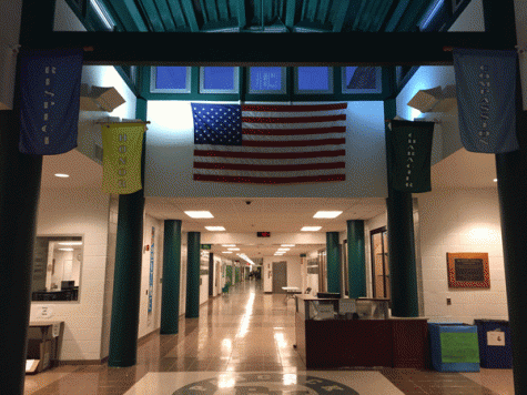A large flag hangs at the entrance of Pascack Valley High School.
