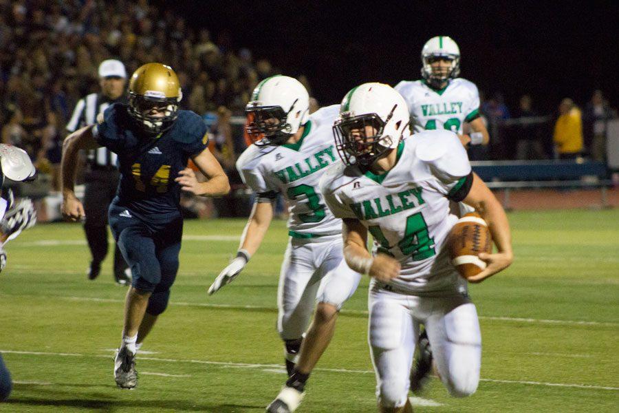 Senior running back Matt Urrea (14) during Friday nights loss to Old Tappan. That game marked Urreas second with 100+ rushing yards.