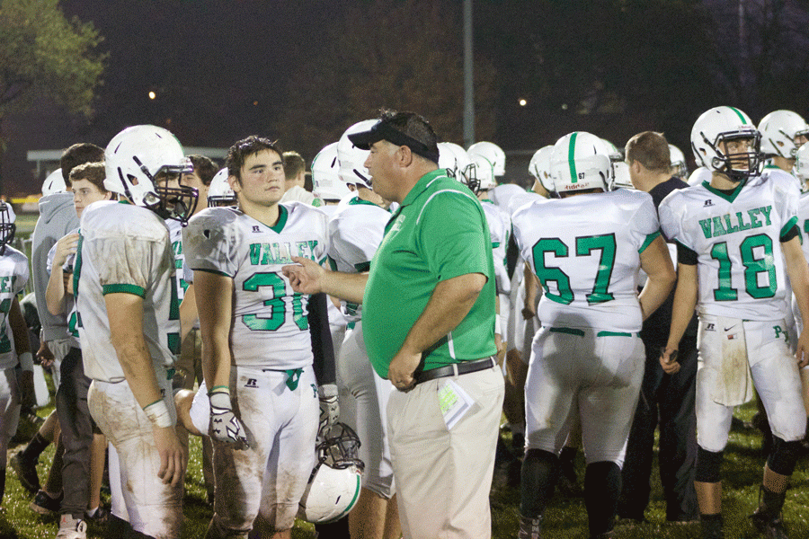Phil Wong (30) on the sideline with assistant coach Jim Cleary. Wong totaled 2.5 sacks last week against Ridgefield Park, and is the anchor of PVs front seven.