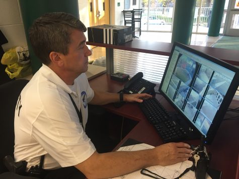 Chief Chip Stalter, one of Pascack Valleys security guards, monitors the schools security cameras from his front desk. 