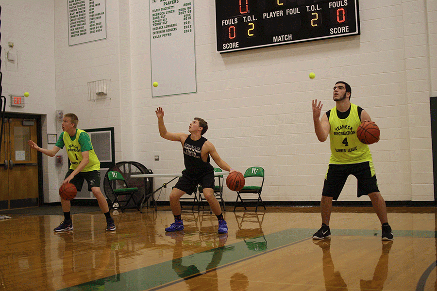 Junior Alex Lin (left), senior Matt Vasel (center) and senior Matt Domville at a practice before the season. Both will look to be major contributors for PV this year.