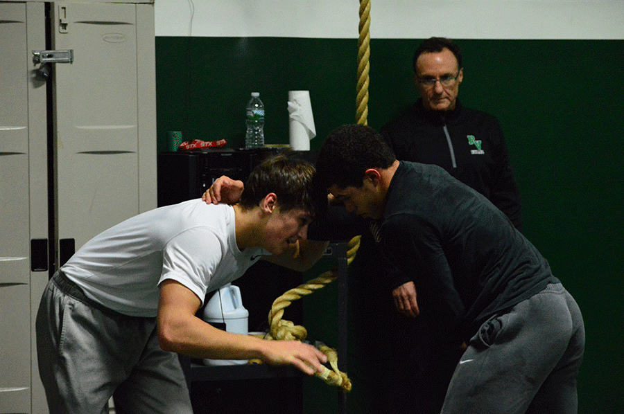 Jake Prusha (left) facing off against Rob Arloro (right) in a practice before the season.