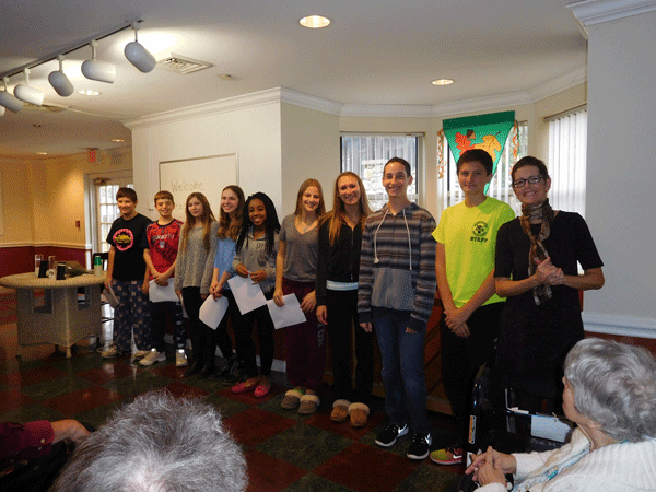 The Theatre Arts class visits the Atrium for Senior Living in Park Ridge.