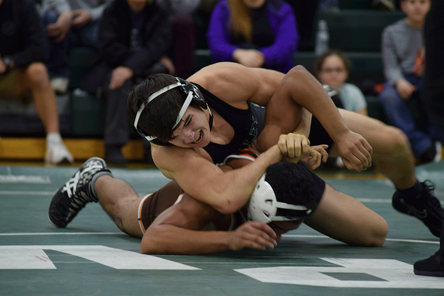 Stephen+Soravilla+works+his+way+to+a+pin+in+the+145-pound+weight+class+during+PVs+51-24+victory+over+Pascack+Hills+on+Thursday.