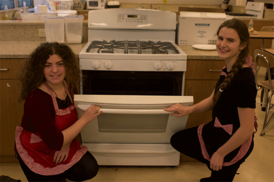 Shauna McLean (left) and Elise DeBiasio have taken to the oven to master the skill of baking.