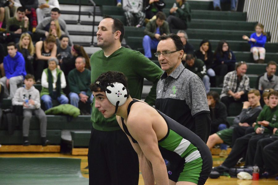 PV wrestling coach Tom Gallione (in green) and wrestler Matt Beyer. PVs season ended this weekend with a 33-32 victory over Nutley.