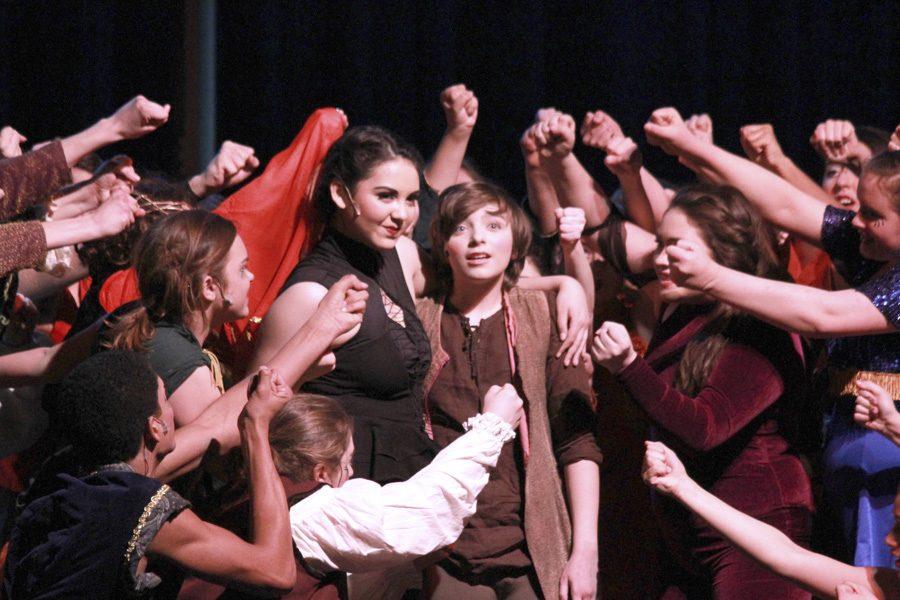 Kaitlyn Toledo (center left) as Leading Player and Gus Koeniges (center right) as Theo.