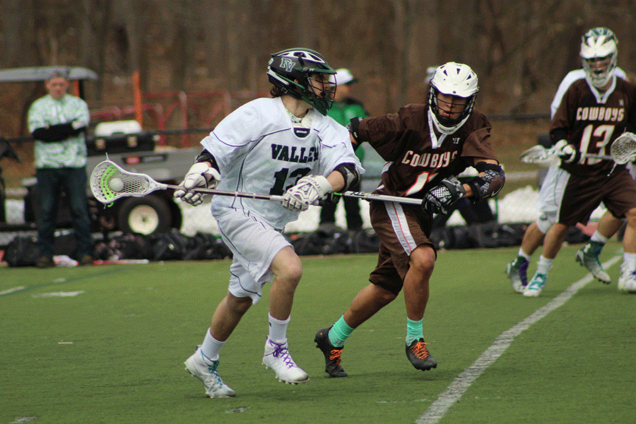 Midfielder+Josh+Tillis+against+Pascack+HIlls+in+the+charity+scrimmage+between+the+two+schools.+Tillis+will+look+to+be+one+of+the+driving+forces+on+offense.