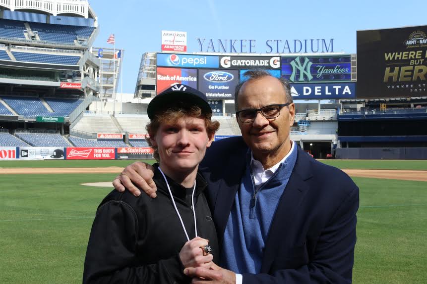 Flanagan and professional baseball executive Joe Torre at Yankee Stadium