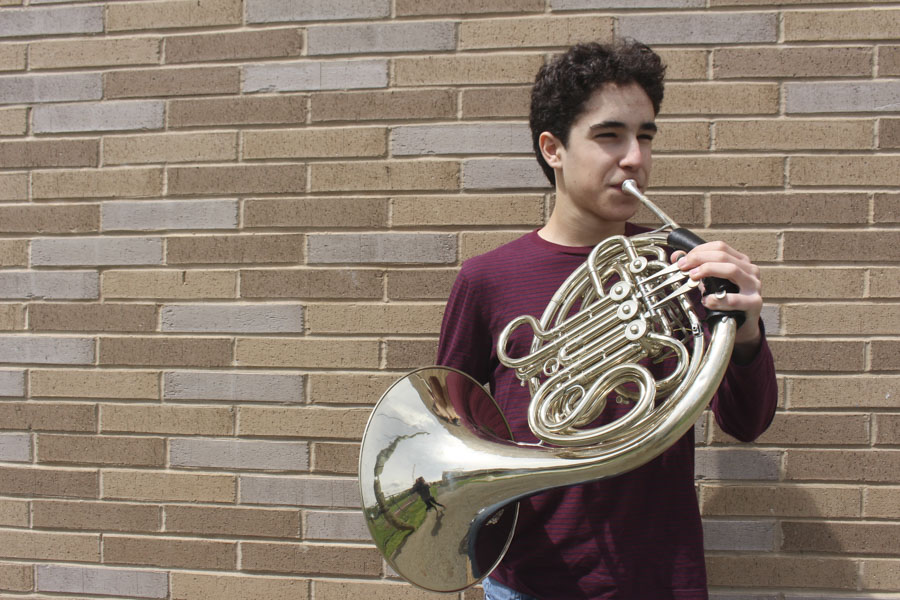 Julian Stiles, a PV junior, plays his French horn. He has many accomplishments with this instrument and others that he plays. 