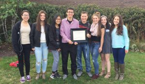 Pictured above (from left): Jamie Ryu, Sarah Schmoyer, Curstine Guevarra, Jake Aferiat, Kyle Comito, Madison Gallo, Kayla Barry, and Lauren Cohen. The 2016-2017 Smoke Signal Editorial Staff presents their plaque for being named the GSSPA’s Distinuighed Journalism Program for
New Jersey’s Division B at last year's GSSPA Conference.