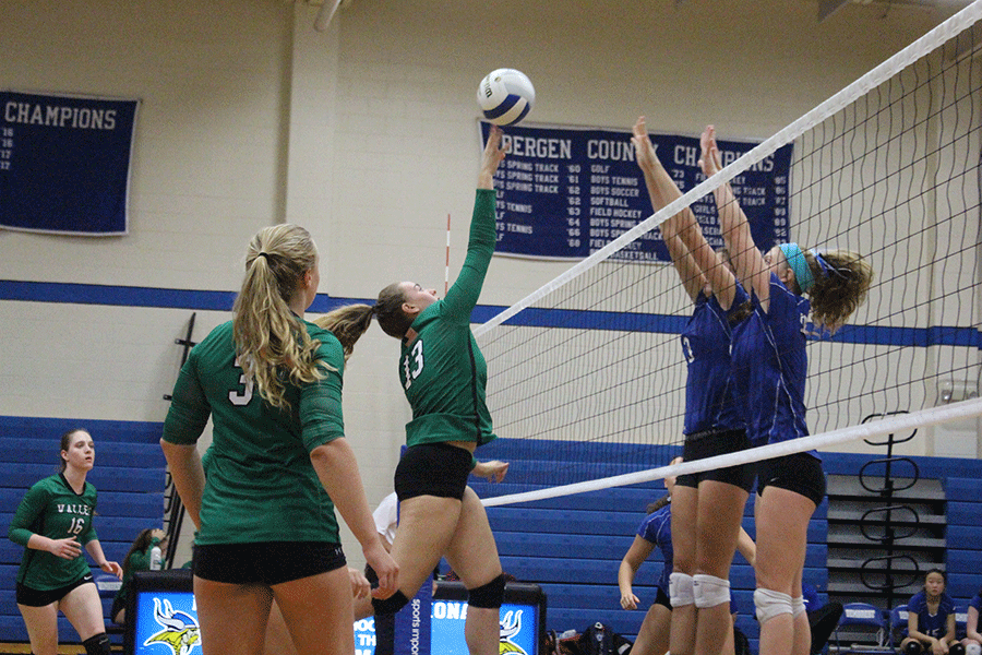 Hannah Linton spikes the ball over the net. The Indians won 10 games in her final season. 