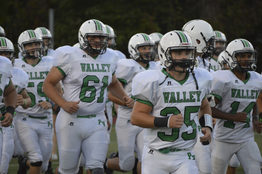 PV football players run onto the field before its game against Ramapo