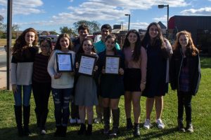Last years Smoke Signal editors pose for a picture with their awards. The staff will attend Rutgers University for the GSSPA Awards on Oct. 29.