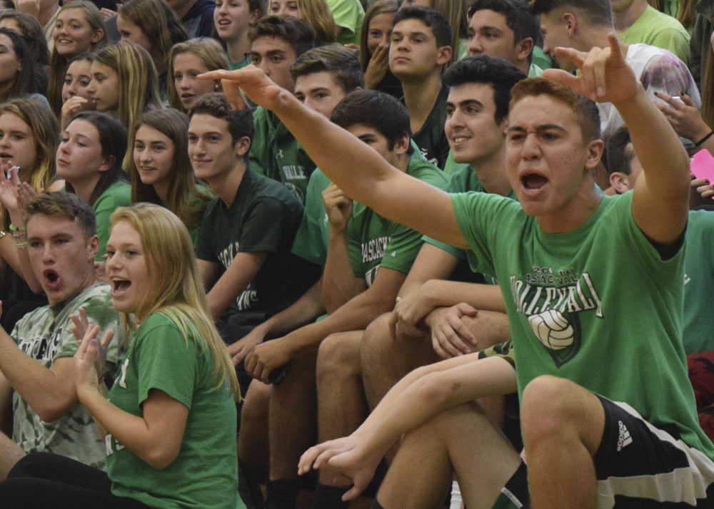 Junior class president Kevin Conrad cheers for his class.