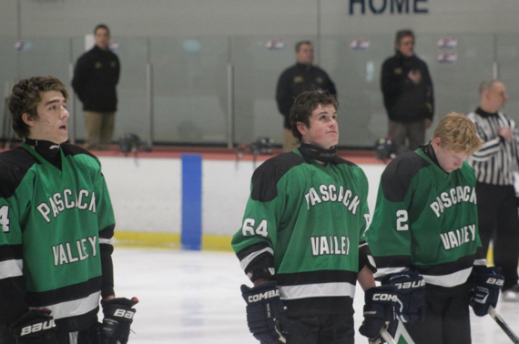 PV hockey players AJ Helfenbein, Alex Sullivan, and Neven Grubic line up prior to a game this season against Fair Lawn.