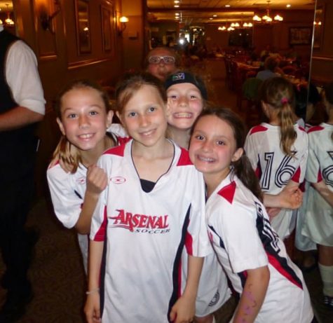 Mallory Downs (back right) and Alyssa Alhadeff (front right) were on the same Arsenal soccer team. Alyssa passed away recently due to the Florida shooting. 