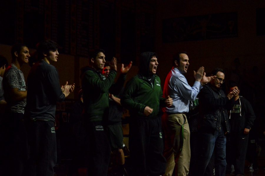 Pascack Valley coaches and wrestlers cheer after Robbie Natelli wins his match against Matthew Murawski of Old Tappan last Friday night. They are wrestling Paramus today in the first round of the North 1, Group 3 tournament.