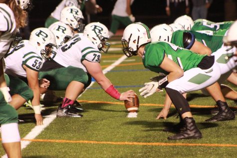The Ramapo center prepares to snap the ball against Pascack Valley. The Indians fell to 3-4 with the loss on Friday.