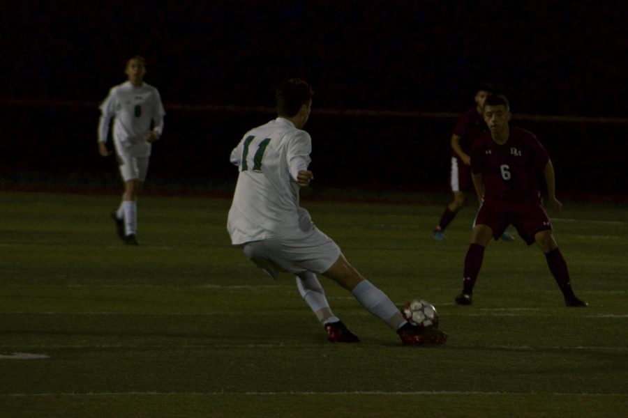 Ryan Mastowski moves the ball around a player of the opposing team.