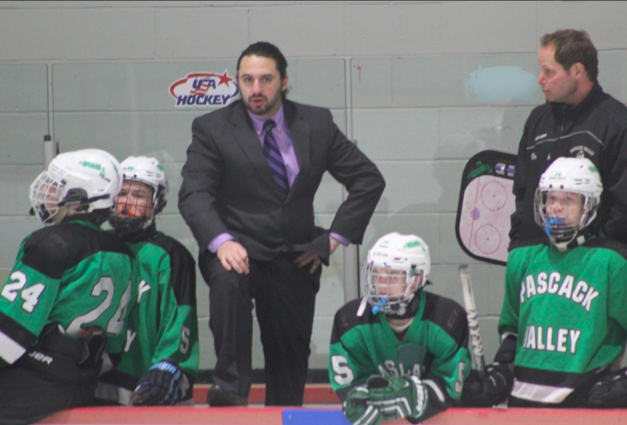 Coach Ken DelSanto looks on from the bench. He will lead the PV/PR/PH Ice Hockey team again this year, which is now made up of students from Pascack Valley, Pascack Hills, and Park Ridge.