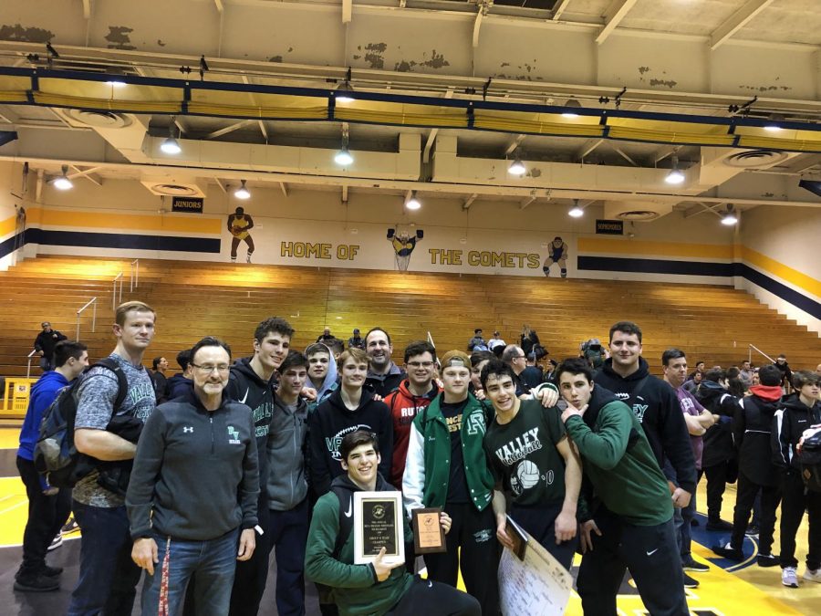 Pascack Valley wrestlers and coaches pose after the BCCA Holiday Wrestling Tournament on Friday. Seniors Tommy Chiellini and Matt Beyer won county titles at their respective weight classes.