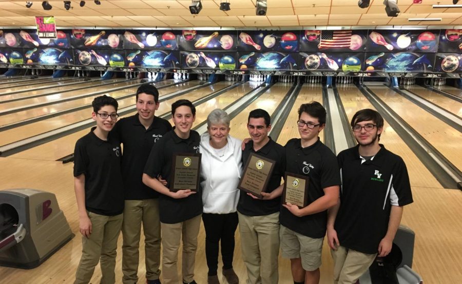 (From left) Evan Murad, Jake Murad, Trevor Lauber, Coach Judy Lucia, Scott Morris, Brian Biml, and James Holland pose after the Indians win in the Tom Irwin Classic. Valley will look to continue its early success and eventually emerge victorious in the county and state sectional tournaments. 