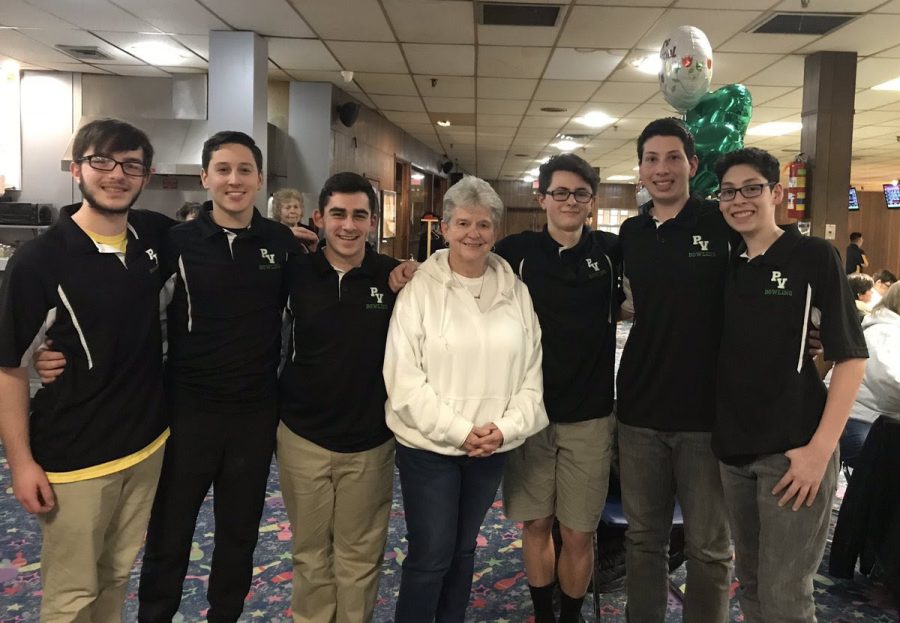Bowlers+James+Holland%2C+Trevor+Lauber%2C+Scott+Morris%2C+Brian+Biml%2C+Jake+Murad%2C+and+Evan+Murad+pose+with+coach+Judy+Lucia.+The+Indians+finished+fifth+in+the+Bergen+County+Tournament.+