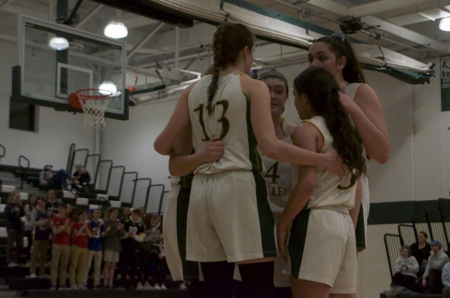 PV players huddle up during the game against Chatham. Valley fell to the Cougars in a three point overtime loss, and their season came to an end. 