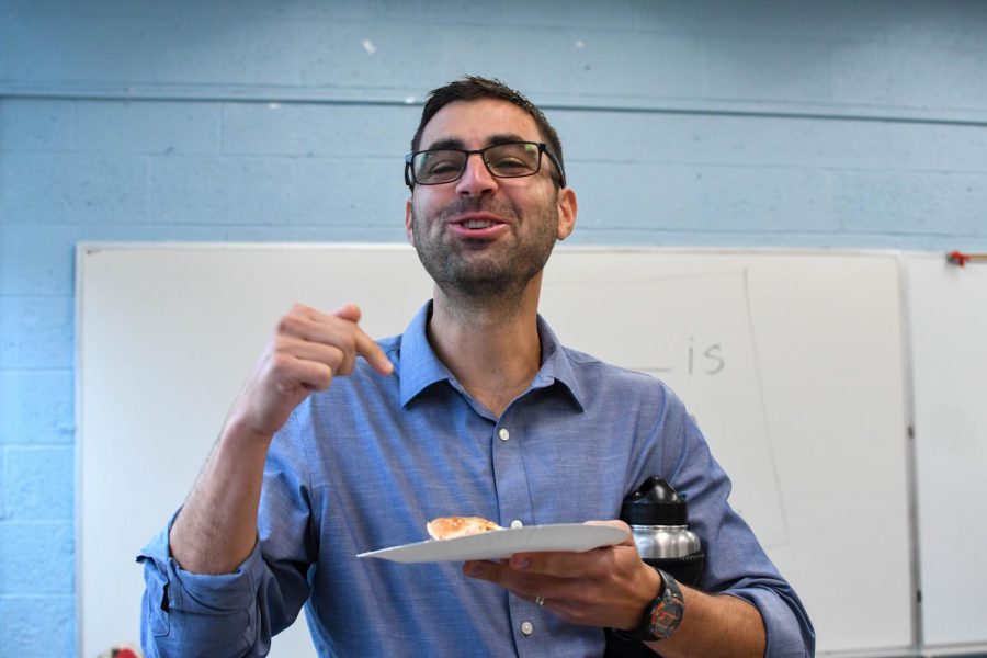 Pascack Valley guidance counselor Jordan Kapp eats the Burger King Impossible™ WHOPPER®. The Smoke Signal hosted a Burger King Impossible™ WHOPPER® taste test during lunch on Sept. 12. 